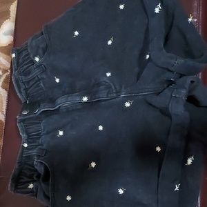 Love,Fire large high-waisted black shorts with daisy embroidery